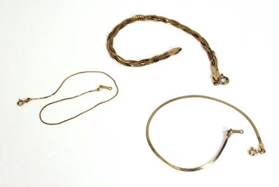Lot 683 - A 9ct yellow gold flat ropetwist bracelet, l....