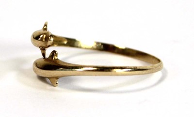 Lot 684 - A 15ct yellow gold crossover ring modelled as...