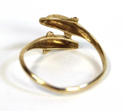 Lot 684 - A 15ct yellow gold crossover ring modelled as...