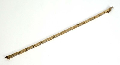 Lot 687 - A 9ct two colour bricklink bracelet, l. 19 cm,...