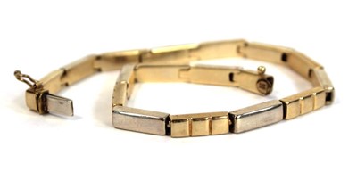 Lot 687 - A 9ct two colour bricklink bracelet, l. 19 cm,...