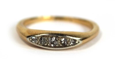 Lot 695 - An 18ct yellow gold ring set five small...