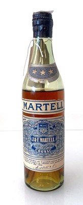 Lot 174 - An old Spring cap half bottle of J&F Martell 3...