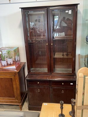 Lot 1719 - Stag display cabinet with lower cupboard storage