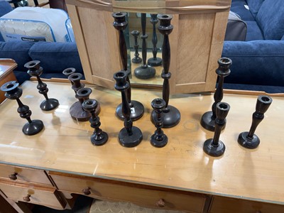 Lot 1734 - Collection of turned wooden candlesticks