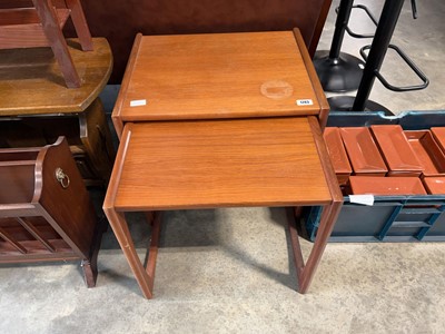 Lot 1743 - Nest of 2 mid century teak coffee tables