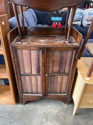 Lot 1749 - Dark oak glazed bookcase and the contents of...