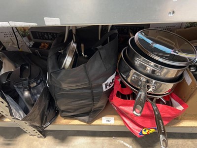 Lot 1102 - 2 black bags, 1 containing cookware pans, 1...