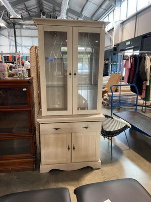 Lot 1757 - Limed wood finish display cabinet with lower...