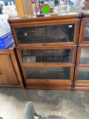 Lot 1758 - Pair of mahogany Wernicker modular bookcases