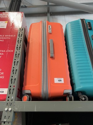 Lot 1129 - Unbranded coral suitcase set