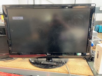 Lot 1157 - Large LG TV with remote, together with a Bush...