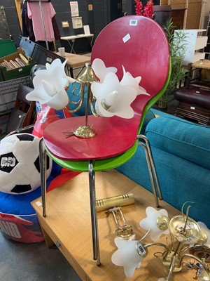 Lot 1797 - Two brightly coloured stacking chairs on...