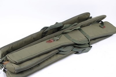 Lot 1332 - Five assorted length padded gun slips
