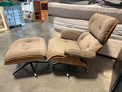 Lot 1853 - Eames-type swivel easy chair, brown...
