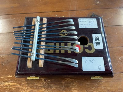 Lot 1858 - African thumb piano constructed from a cigar box