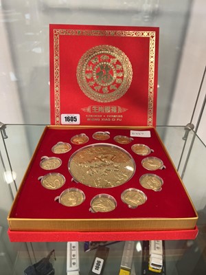 Lot 1605 - Boxed Sheng Xiao Ci Fu plated coin set