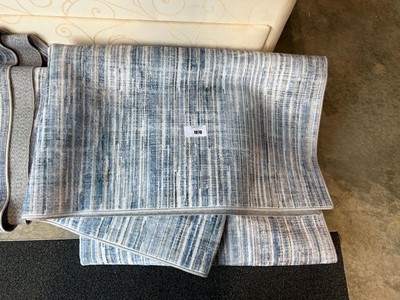 Lot 1870 - 2 loose Wyatt & Ash machine washable area rugs,...