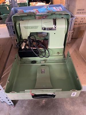 Lot 1628 - Supermatic sewing machine in hard metal carry...