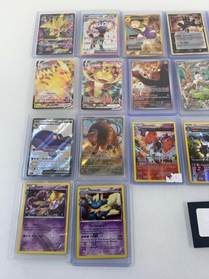 Lot 1434 - Approx. 25 Top Loaded Pokémon cards from...