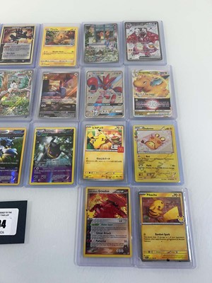 Lot 1434 - Approx. 25 Top Loaded Pokémon cards from...