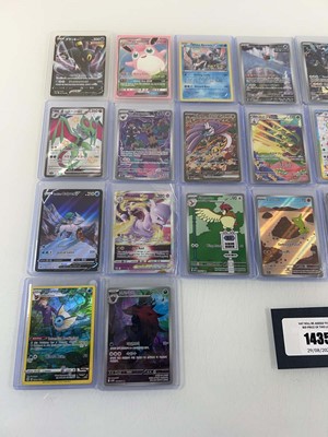 Lot 1435 - Approx. 25 Top Loaded Pokémon cards from...