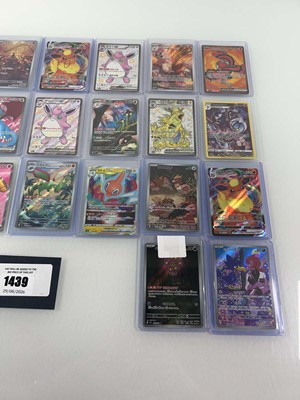 Lot 1439 - Approx. 25 Top Loaded Pokémon cards from...
