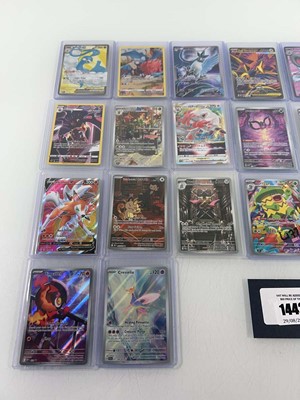Lot 1442 - Approx. 25 Top Loaded Pokémon cards from...