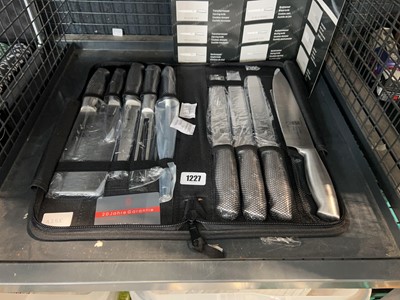 Lot 1227 - Japan triple hardened steel 9pce knife set in...
