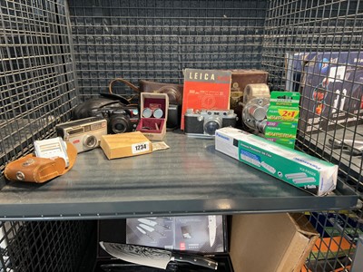 Lot 1234 - Cage of assorted camera equipment including a...