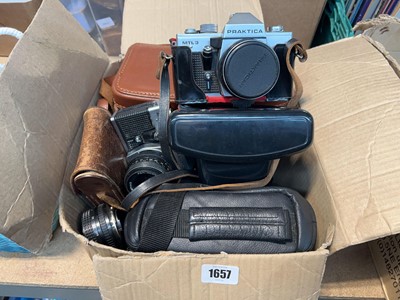 Lot 1657 - Box of camera equipment including a Praktica...