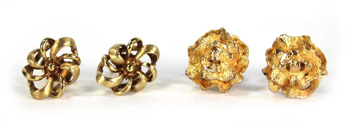 Lot 723 - A pair of 9ct yellow gold ear studs of...