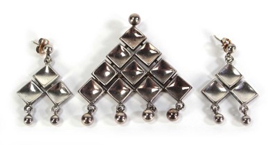 Lot 727 - A David Andersen silver pendant of triangular...