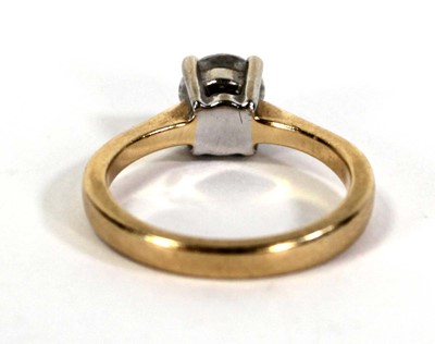 Lot 729 - An 18ct yellow gold yellow gold ring set...