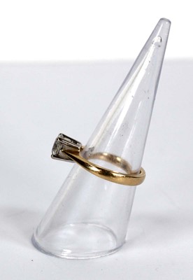 Lot 729 - An 18ct yellow gold yellow gold ring set...