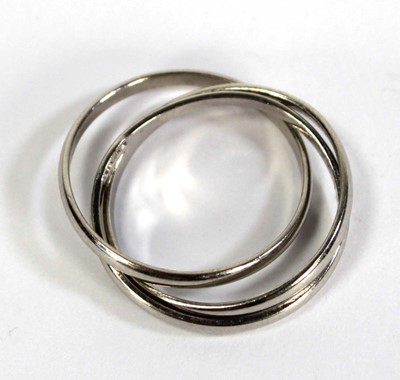 Lot 732 - A 9ct white gold three band ring, ring size N,...