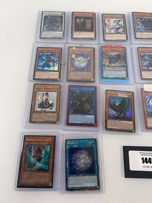 Lot 1445 - Approx. 18 Top Loaded Yu-Gi-Oh cards from...