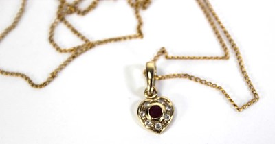 Lot 737 - A 9ct yellow gold finelink necklace suspending...