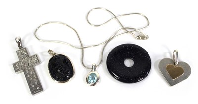 Lot 738 - A silver snakelink necklace suspending a...