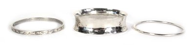 Lot 739 - Three silver bangles including a Charles...