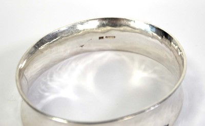 Lot 739 - Three silver bangles including a Charles...