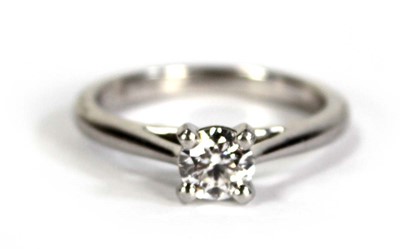 Lot 743 - A platinum ring set brilliant cut diamond in a...