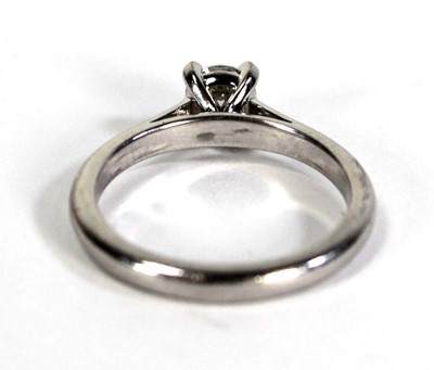 Lot 743 - A platinum ring set brilliant cut diamond in a...