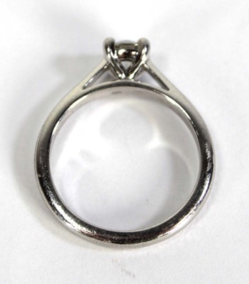 Lot 743 - A platinum ring set brilliant cut diamond in a...