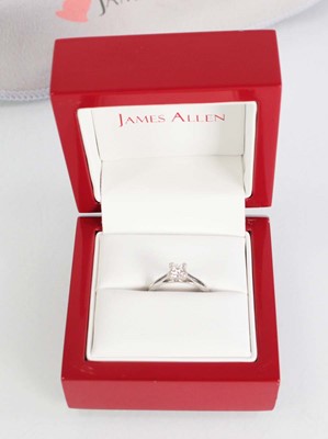 Lot 743 - A platinum ring set brilliant cut diamond in a...