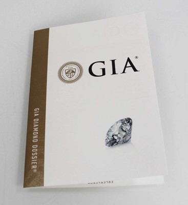 Lot 743 - A platinum ring set brilliant cut diamond in a...