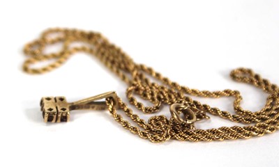 Lot 752 - A 9ct ropetwist necklace suspending a 9ct...