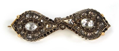 Lot 754 - An 18ct yellow gold brooch constructed from a...