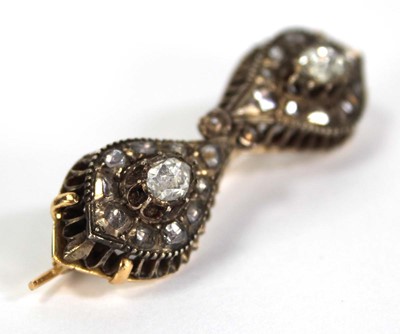 Lot 754 - An 18ct yellow gold brooch constructed from a...