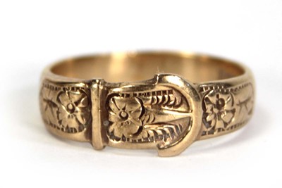 Lot 756 - A 9ct yellow gold buckle ring, Birmingham 1959,...
